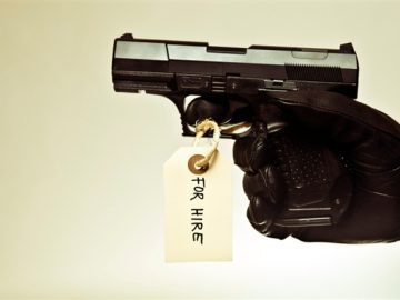 Would be hitman busted after being fooled by parody website scaled