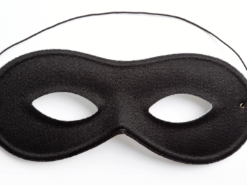 Black mask on white background.