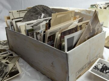 Deleted iPhone photos show up again after iOS update box of old photos