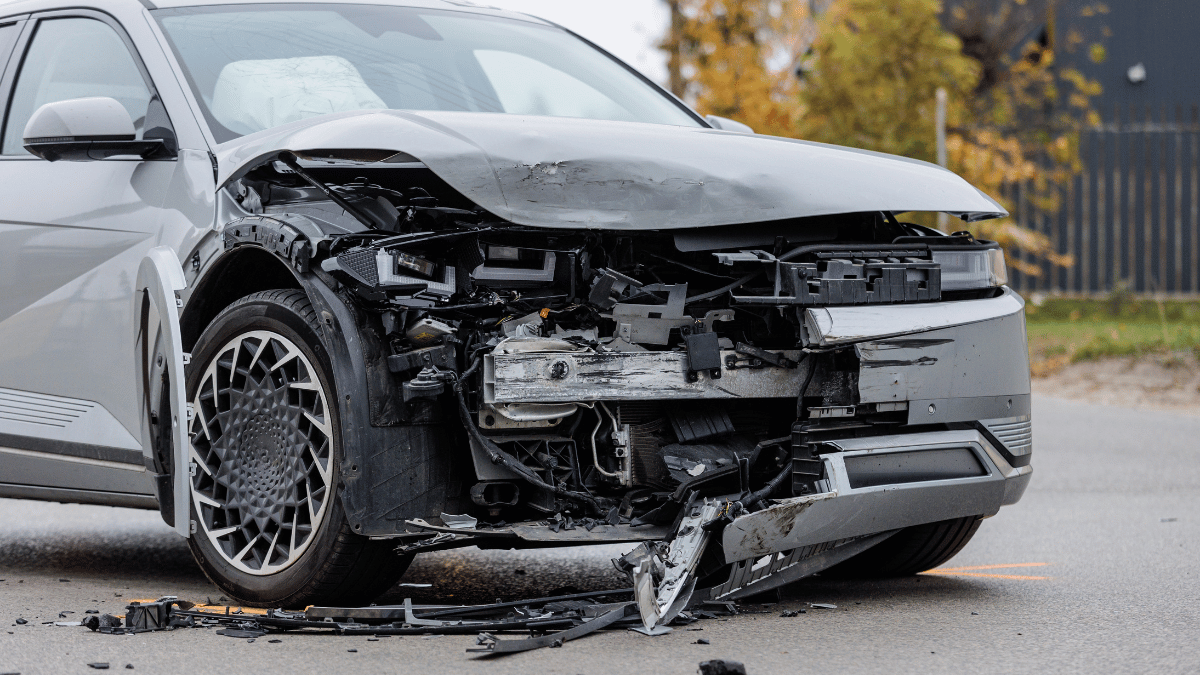 ‘Car crash victim’ calls mother for help and $15K bail money. But it’s an AI voice scam Dark colored car which has suffered an accident to the front of it and is damaged