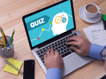 man taking online quiz on laptop