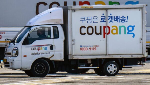 A worker drives a delivery truck of South Korean e-commerce giant Coupang in Seoul. Photo: AFP